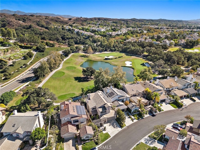 birds eye view of property featuring a water view, a residential view, and golf course view