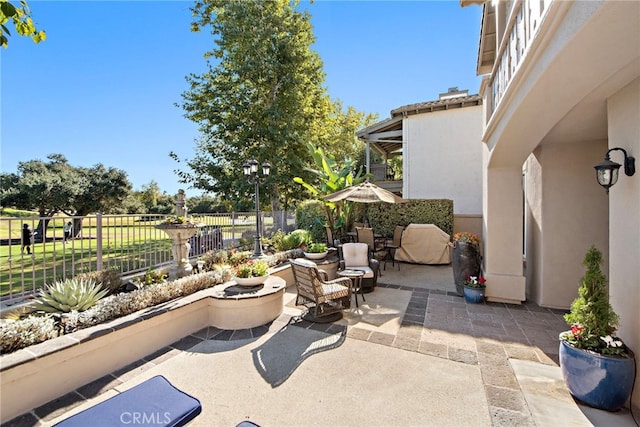 view of patio with fence