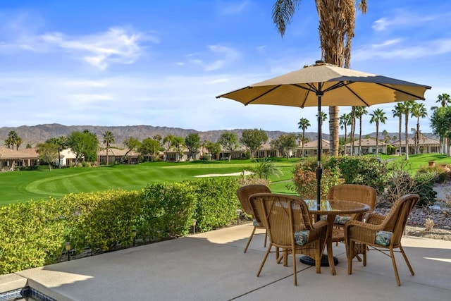 view of patio with a mountain view