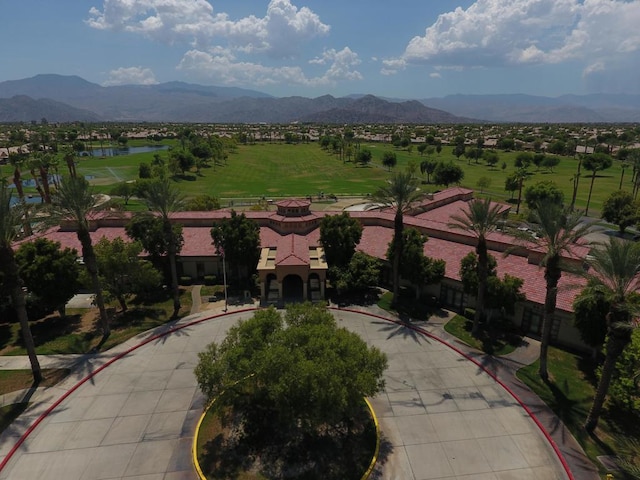 birds eye view of property featuring a mountain view