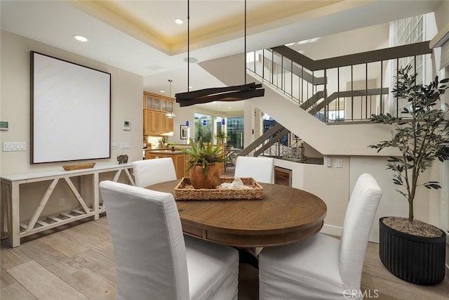 dining room with light wood-type flooring