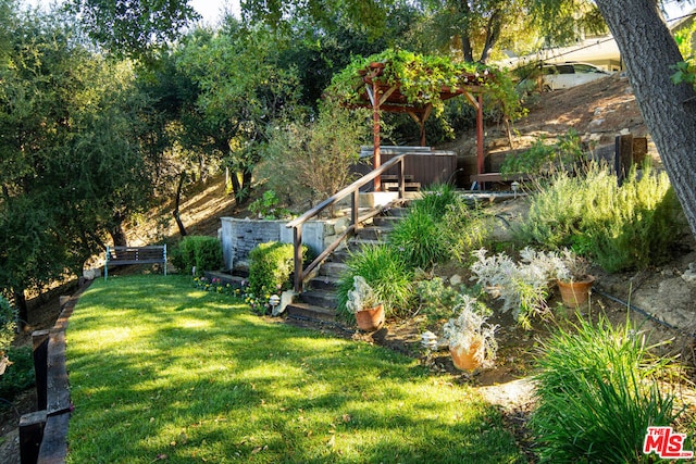 view of yard with a pergola