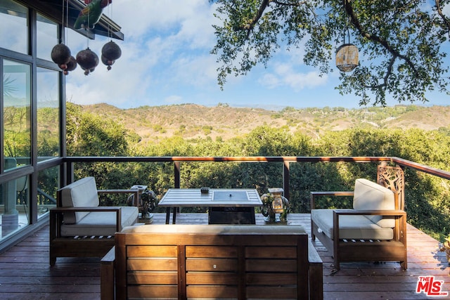 deck featuring a mountain view