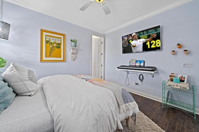 bedroom featuring ceiling fan, dark hardwood / wood-style flooring, and crown molding