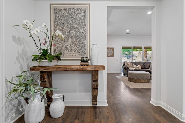 hallway featuring dark wood-type flooring