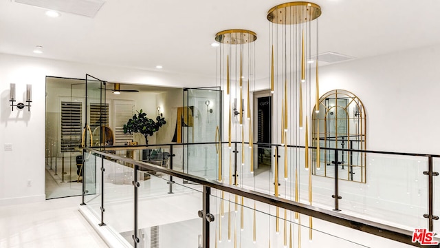 hallway featuring light tile patterned floors