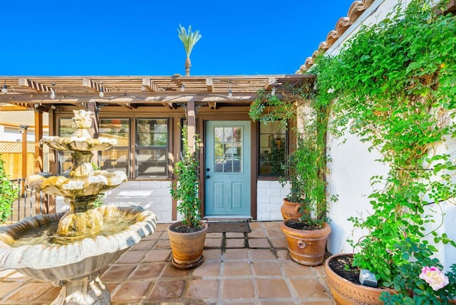 property entrance with a patio