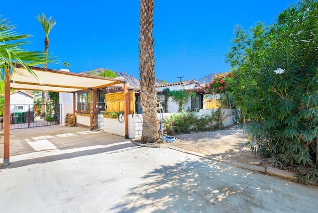 view of front of property with a mountain view