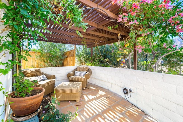 view of patio with an outdoor living space and a pergola