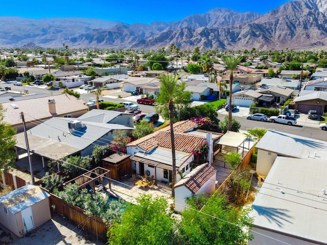 drone / aerial view featuring a mountain view