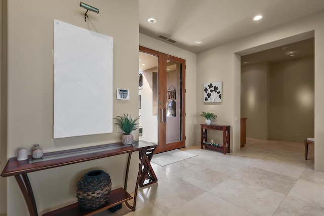 entrance foyer featuring french doors