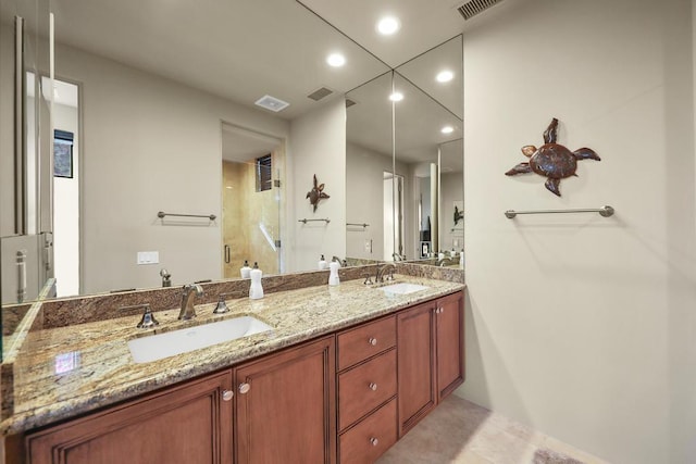 bathroom with vanity and walk in shower