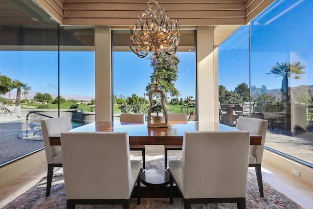 interior space with a mountain view and an inviting chandelier