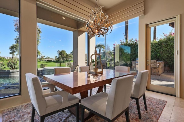 sunroom with a notable chandelier