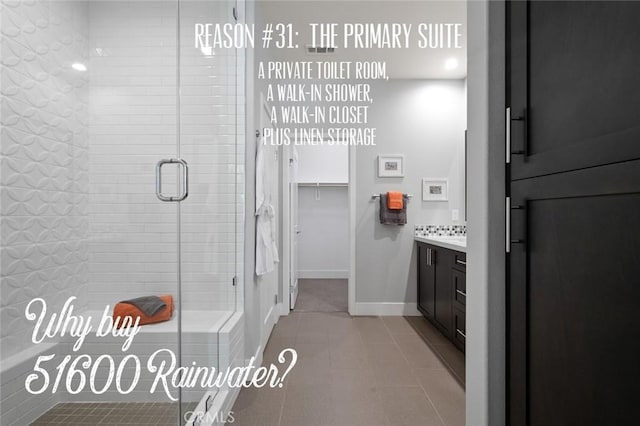 bathroom featuring tile patterned floors, vanity, and an enclosed shower