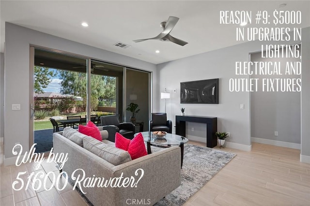 living room with ceiling fan and light hardwood / wood-style floors