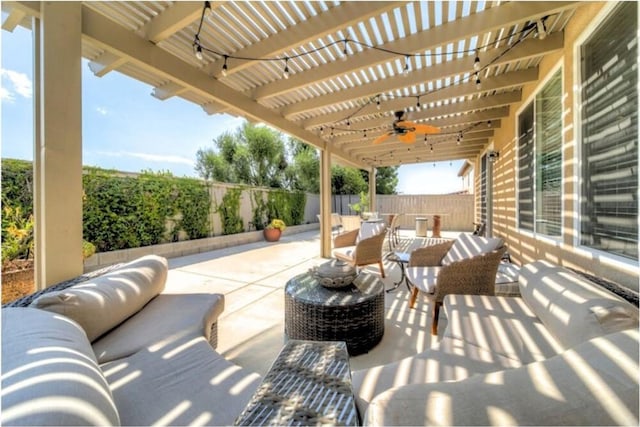 view of patio / terrace with an outdoor hangout area, ceiling fan, and a pergola