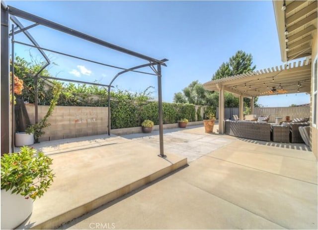 view of patio featuring a pergola and an outdoor hangout area