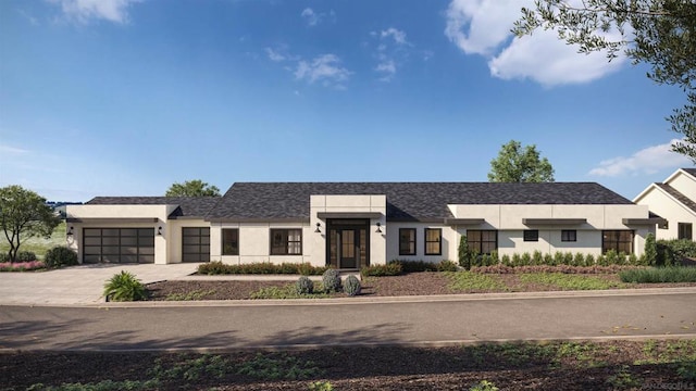 view of front of property with a garage