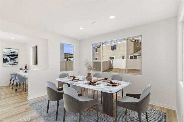 dining room featuring light hardwood / wood-style floors