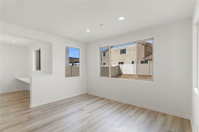 empty room with light wood-type flooring