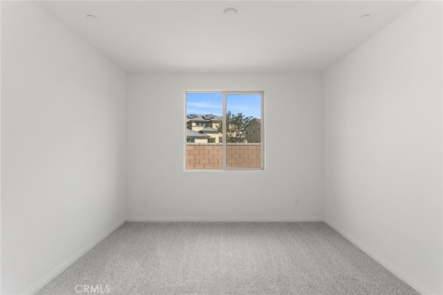 empty room featuring carpet flooring