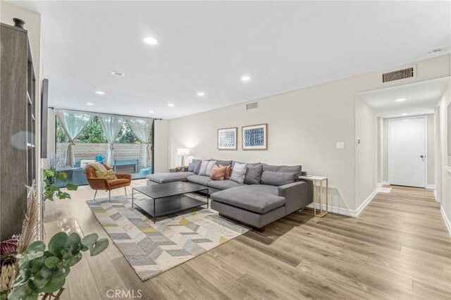 living room featuring light hardwood / wood-style floors