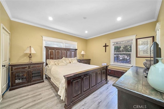 bedroom with light wood-type flooring and ornamental molding