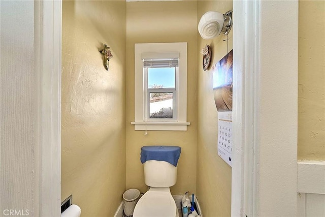 bathroom featuring toilet