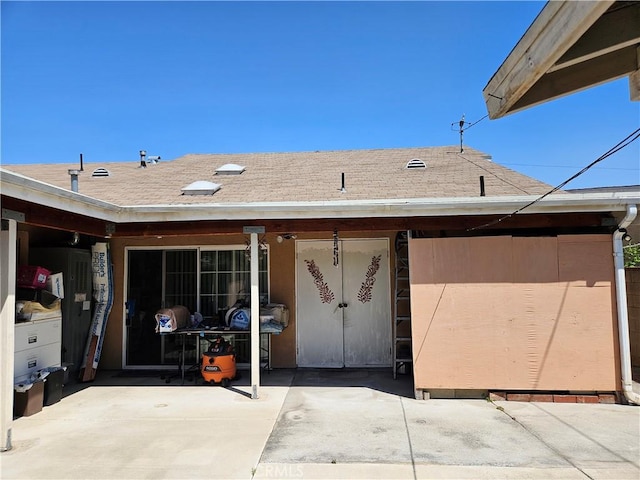 rear view of house featuring a patio area