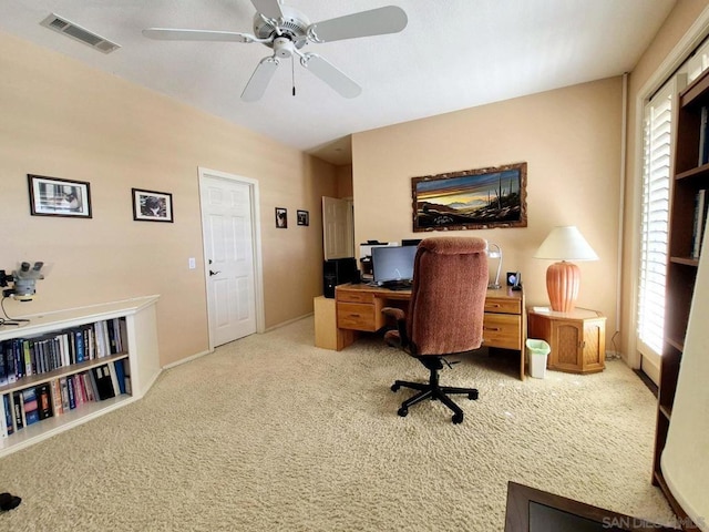 home office with light colored carpet and ceiling fan