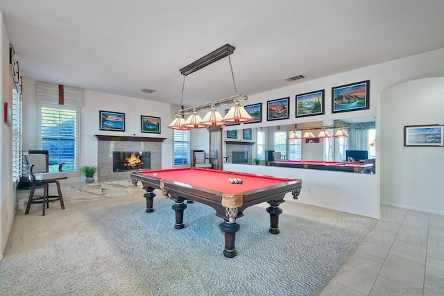 playroom with a fireplace and billiards