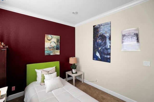 carpeted bedroom featuring crown molding