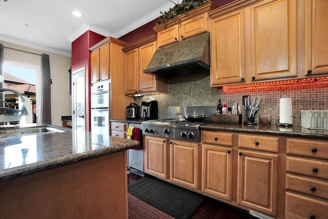 kitchen featuring decorative backsplash, ornamental molding, white double oven, sink, and stainless steel gas stovetop