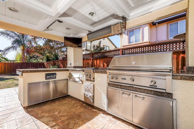 view of patio / terrace featuring an outdoor kitchen and area for grilling