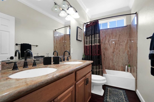 full bathroom featuring crown molding, hardwood / wood-style floors, toilet, shower / tub combo with curtain, and vanity