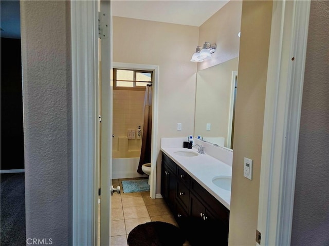 full bathroom with tile patterned flooring, vanity, shower / bath combination with curtain, and toilet