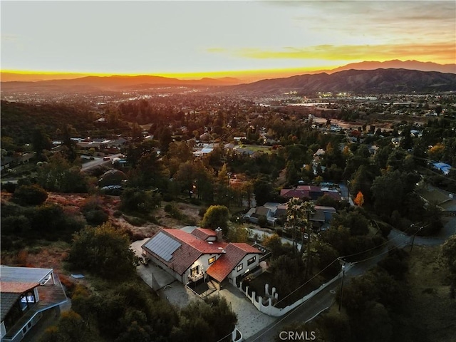 aerial view at dusk with a mountain view