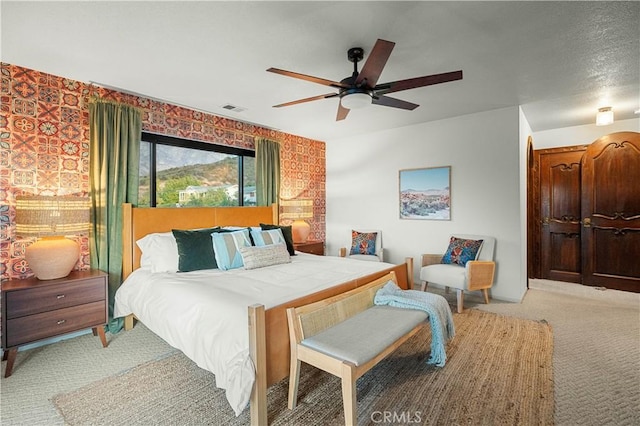 bedroom featuring carpet floors and ceiling fan