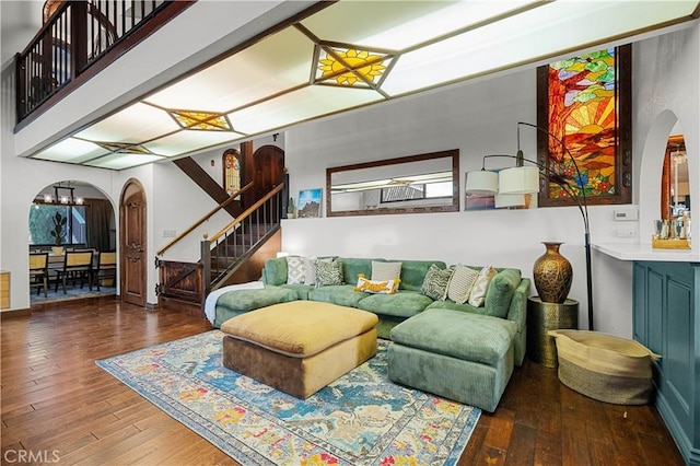 living room featuring hardwood / wood-style floors and a chandelier