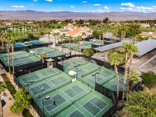 birds eye view of property featuring a mountain view