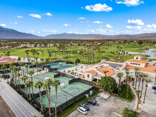 birds eye view of property featuring a mountain view