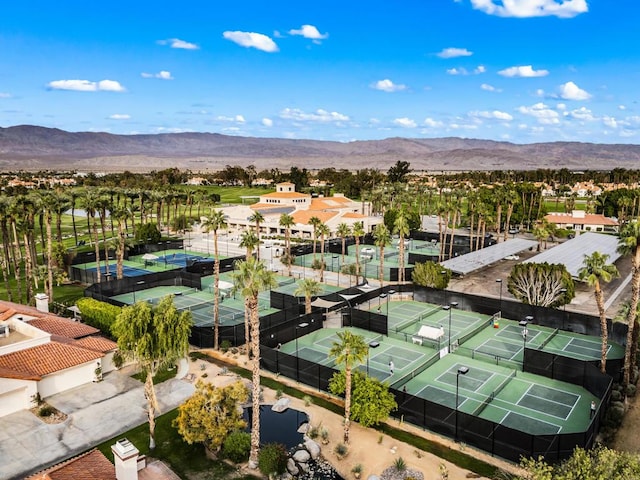 birds eye view of property featuring a mountain view