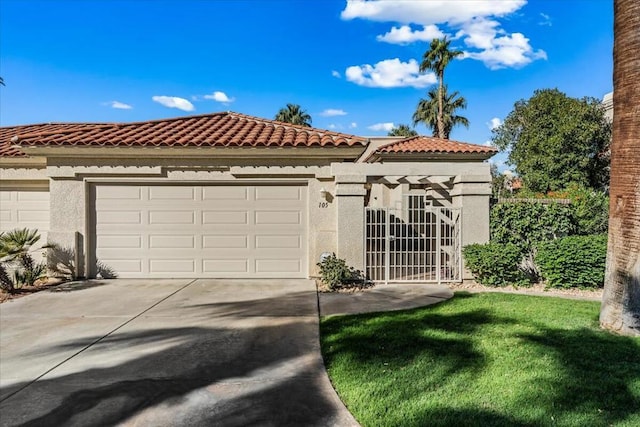 mediterranean / spanish-style home featuring a garage