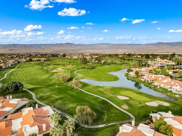 view of home's community with a water and mountain view