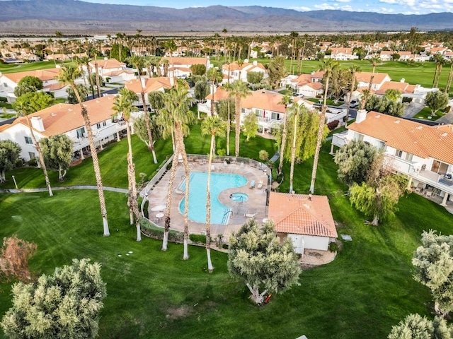 drone / aerial view featuring a mountain view