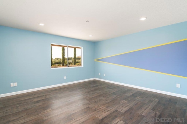 empty room featuring dark hardwood / wood-style floors