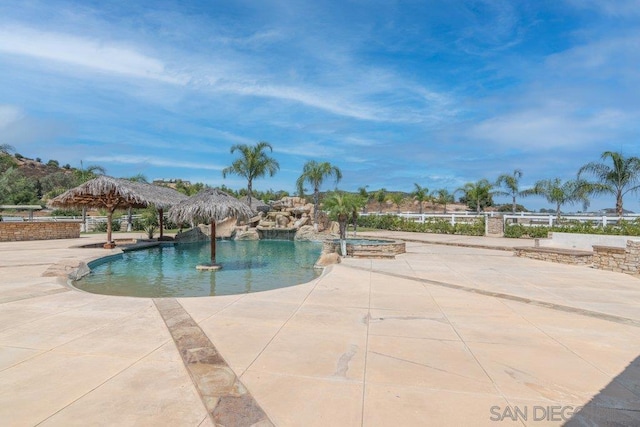 view of pool featuring a gazebo and a patio area