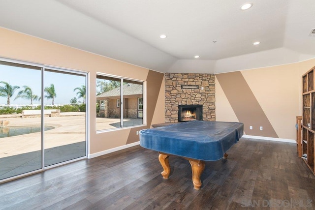 rec room with a stone fireplace, dark hardwood / wood-style floors, and pool table