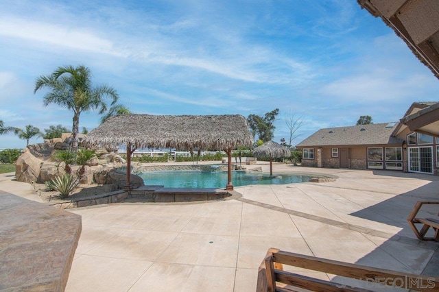 view of swimming pool featuring a gazebo and a patio area